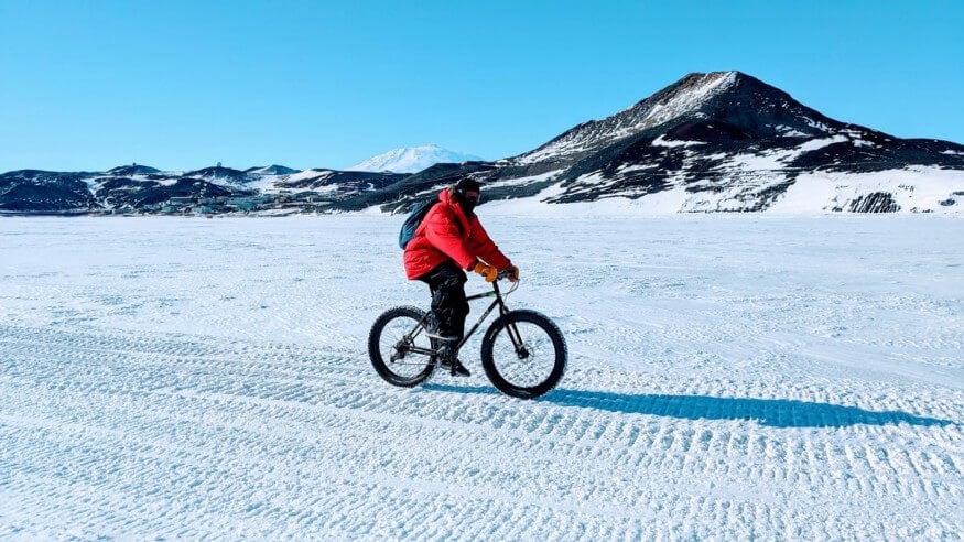 An image showing Dr. Longmier riding an "Ice Bike" 